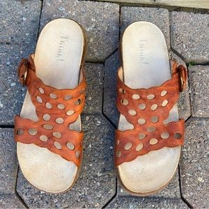 Think women tangerine and brown laser cut designed slip on sandal. Size 37. Used